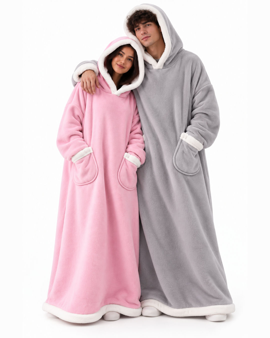 Two people wrapped in THE BLANKET HOODIE™