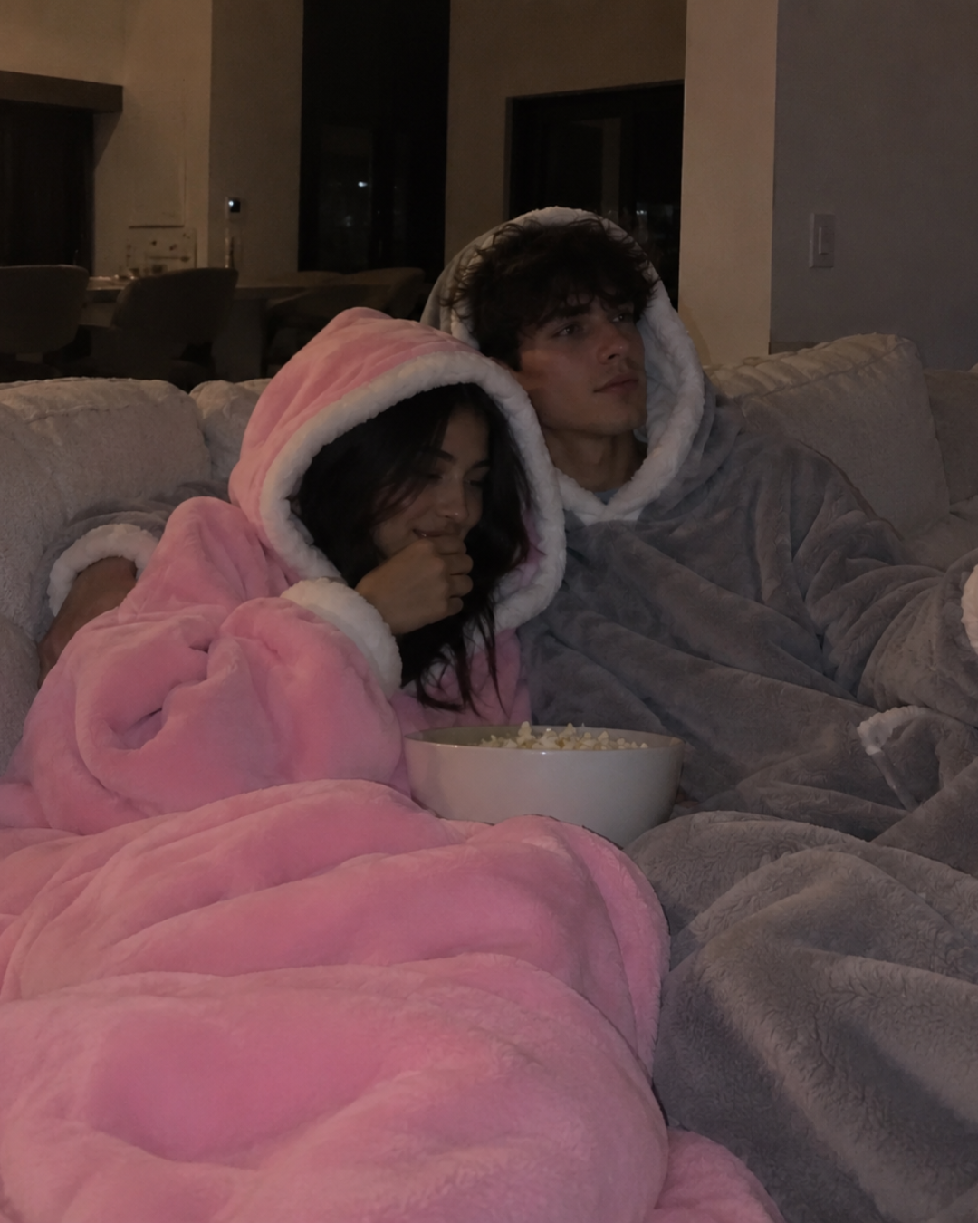 Couple relaxing together in THE BLANKET HOODIE™